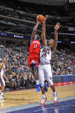 Philadelphia 76ers v New Jersey Nets: Jrue Holiday and Derrick Favors Photographic Print by David Dow