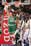 Boston Celtics v New Jersey Nets: Semih Erden and Johan Petro Photographic Print by Jeyhoun Allebaugh