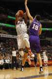 Phoenix Suns v Charlotte Bobcats: Derrick Brown and Hedo Turkoglu Photographic Print by Kent Smith