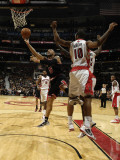 Chicago Bulls v Toronto Raptors: Carlos Boozer, Ed Davis and DeMar DeRozan Photographic Print by Ron Turenne