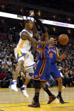 New York Knicks v Golden State Warriors: Monta Ellis and Ronny Turiaf Photographic Print by Ezra Shaw