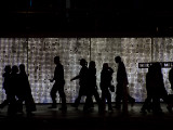 Pedestrians Walk in Front of a Light Display in Las Vegas Photographic Print by Jodi Cobb