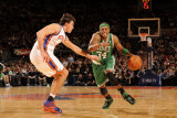 Boston Celtics v New York Knicks: Paul Pierce and Danilo Gallinari Photographic Print by Lou Capozzola