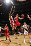 New Jersey Nets v Toronto Raptors: Devin Harris and Amir Johnson Photographic Print by Ron Turenne