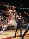 Denver Nuggets v Toronto Raptors: Nene and Jerryd Bayless Photographic Print by Ron Turenne