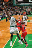 Chicago Bulls v Boston Celtics: Kevin Garnett and Luol Deng Photographic Print by Brian Babineau