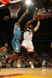 New Orleans Hornets v Miami Heat: Dwyane Wade and Emeka Okafor Photographic Print by Issac 