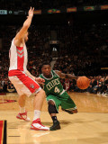 Boston Celtics v Toronto Raptors: Nate Robinson and Andrea Bargnani Photographic Print by Ron Turenne