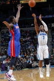 Detroit Pistons v New Orleans Hornets: Chris Paul and Rodney Stuckey Photographic Print by Layne Murdoch
