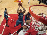 Minnesota Timberwolves v Chicago Bulls: Michael Beasley and Taj Gibson Photographic Print by Ray Amati