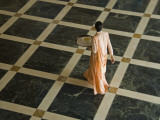 At a Luxury Hotel, Women Welcome Wealthy Businessmen and Travelers Photographie par Jodi Cobb
