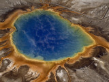 Algae-Tinted Shallows Ring Yellowstone's Steaming Grand Prismatic Spring Photographic Print by Raymond Gehman