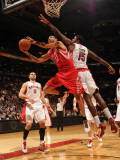 Houston Rockets v Toronto Raptors: Kevin Martin and Amir Johnson Photographic Print by Ron Turenne