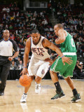 Boston Celtics v New Jersey Nets: Stephen Graham and Avery Bradley Photographic Print by Jeyhoun Allebaugh