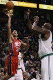 New Jersey Nets v Boston Celtics: Devin Harris and Shaquille O'Neal Photographic Print by Elsa .