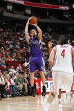 Sacramento Kings v Houston Rockets: Beno Udrih and Luis Scola Photographic Print by Bill Baptist