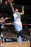 San Antonio Spurs v Denver Nuggets: Carmelo Anthony and Tim Duncan Photographic Print by Garrett Ellwood