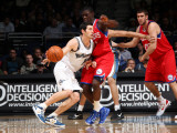 Philadelphia 76ers v Washington Wizards: Kirk Hinrich and Jrue Holiday Photographic Print by Ned Dishman