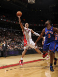 New York Knicks v Toronto Raptors: Jerryd Bayless and Shawne Williams Photographic Print by Ron Turenne