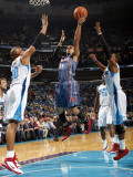 Charlotte Bobcats v New Orleans Hornets: D.J. Augustin, David West and Chris Paul Photographic Print by Layne Murdoch