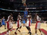 Oklahoma City Thunder v Toronto Raptors: Ed Davis, Amir Johnson and Russell Westbrook Photographic Print by Ron Turenne