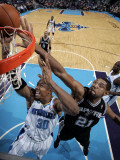 San Antonio Spurs v New Orleans Hornets: David West and Tim Duncan Photographic Print by Layne Murdoch