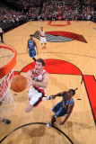 Minnesota Timberwolves v Portland Trail Blazers: Jonny Flynn and Rudy Fernandez Photographic Print by Sam Forencich