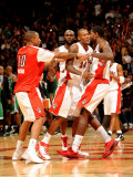 Boston Celtics v Toronto Raptors: Amir Johnson, DeMar DeRozan and Sonny Weems Photographie par Ron Turenne
