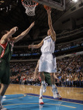 Milwaukee Bucks v Dallas Mavericks: Dirk Nowitzki and Andrew Bogut Photographic Print by Danny Bollinger