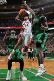 Toronto Raptors v Boston Celtics: Sonn Weems and Kevin Garnett Photographic Print by Brian Babineau