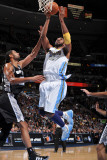 San Antonio Spurs v Denver Nuggets: Nene and Tim Duncan Photographic Print by Garrett Ellwood