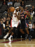 Atlanta Hawks v Toronto Raptors: Julian Wright and Jordan Crawford Photographic Print by Ron Turenne