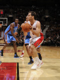 Oklahoma City Thunder v Toronto Raptors: Russell Westbrook and Jose Calderon Photographic Print by Ron Turenne