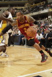 Cleveland Cavaliers  v Indiana Pacers: Mo Williams and Darren Collison Photographic Print by Ron Hoskins