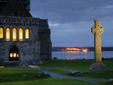 A Celtic Cross Stands Outside the Iona Monastery Church at Dusk Photographic Print by Jim Richardson