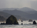 The Rocky and Steep Oregon Coast on a Cloudy Afternoon Photographic Print by Michael Hanson