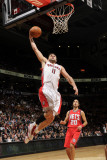 New Jersey Nets v Toronto Raptors: Linas Kleiza and Sasha Vujacic Photographic Print by Ron Turenne