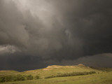 Thunderclouds Gather Above Little Missouri Grasslands and Buttes Photographic Print by Phil Schermeister