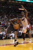 Charlotte Bobcats v Miami Heat: Tyrus Thomas and Chris Bosh Photographic Print by Mike Ehrmann