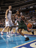 Milwaukee Bucks v Dallas Mavericks: Brandon Jennings and Dirk Nowitzki Photographic Print by Danny Bollinger
