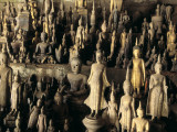 Buddhas and Other Figures in a Pak Ou Cave Photographic Print by Alison Wright