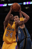 Washington Wizards v Los Angeles Lakers: Kobe Bryant and Javale McGee Photographic Print by Jeff 
