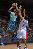New Orleans Hornets v Detroit Pistons: Trevor Ariza and Tracy McGrady Photographic Print by Allen Einstein