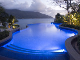 An Infinity Pool and an Ocean View at a Resort Hotel Photographic Print by Alison Wright