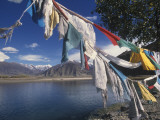 Prayer Flags Along the Yarlung Tsangpo (Brahmaputra) River Photographic Print by Alison Wright