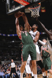 Milwaukee Bucks v San Antonio Spurs: Andrew Bogut and Tim Duncan Photographic Print by D. Clarke Evans