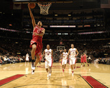 Houston Rockets v Toronto Raptors: Kevin Martin and DeMar DeRozan Photographic Print by Ron Turenne