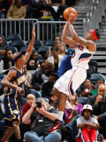 Indiana Pacers v Atlanta Hawks: Jeff Teague and T.J. Ford Photographic Print by Kevin Cox