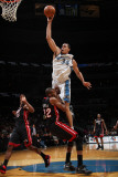 Miami Heat v Washington Wizards: JaVale McGee and James Jones Photographic Print by Ned Dishman