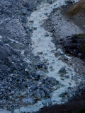 A Stream Running Through the Valley of Death Photographic Print by Michael Melford
